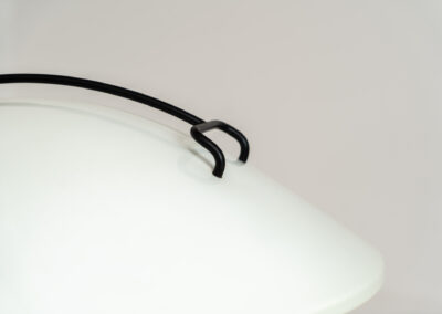 Radar table lamp by Elio Martinelli for Martinelli Luce (Italy, 1970s). This highly sought-after masterpiece features a unique circular shape resembling a radar dish, with a light source at its center. The lamp’s sleek and futuristic design makes it a timeless piece of functional art. The shade is adjustable with a chrome lever. In very good and original condition with a few scratches, visible on the pictures.