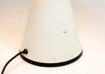 Radar table lamp by Elio Martinelli for Martinelli Luce (Italy, 1970s). This highly sought-after masterpiece features a unique circular shape resembling a radar dish, with a light source at its center. The lamp’s sleek and futuristic design makes it a timeless piece of functional art. The shade is adjustable with a chrome lever. In very good and original condition with a few scratches, visible on the pictures.
