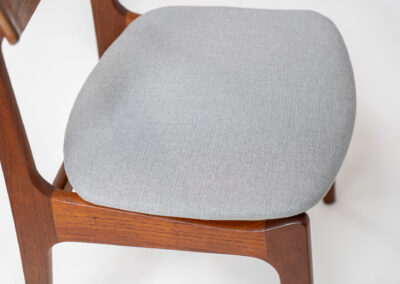 Set of 6 teak dining chairs by Erik Buch for Funder-Schmidt & Madsen (Denmark, 1950s). Durable Danish quality and a beautiful design, made out of teak. They have nice organic lines and the typical floating seats. The chairs are fully restored and newly upholstered in a grey fabric. Ready for another lifetime. Burn marked by maker.