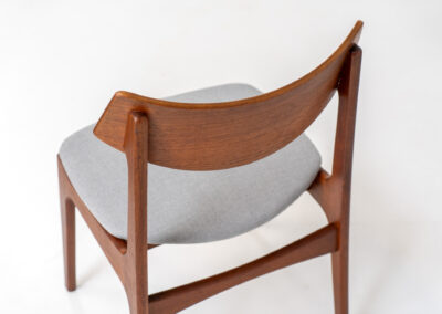 Set of 6 teak dining chairs by Erik Buch for Funder-Schmidt & Madsen (Denmark, 1950s). Durable Danish quality and a beautiful design, made out of teak. They have nice organic lines and the typical floating seats. The chairs are fully restored and newly upholstered in a grey fabric. Ready for another lifetime. Burn marked by maker.