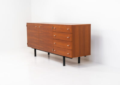 Modernist “1864” sideboard by Pierre Guariche for Meurop (Belgium, 1960s). A beautiful example of Belgian modernism! It features a warm meranti woodgrain, a sleek black lacquered metal frame and aluminium handles. It remains in very good condition with normal using traces.