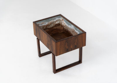 Rosewood planter by Kai Kristiansen for Salin Møbler (Denmark, 1960s). A nicely designed piece by a great designer. It contains a galvanized steel box inside which is perfectly water proof. This planter is very minimalistic, yet an eye catcher in the room. It is often used to store LP’s. In very good condition!