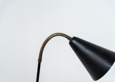 A grasshopper floorlamp by Svend Aage Holm Sørensen for ASEA (Sweden, 1950s). A contemporary and subtle piece with some beautiful details like the brass little feet or the brass joint which can be used to adjust the shade. It is newly rewired for safety reasons, furthermore it is in original condition. There are clearly traces of use and age, like some dents and scratches. We love it in this vintage condition but it can be refinished on request.