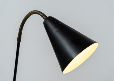 A grasshopper floorlamp by Svend Aage Holm Sørensen for ASEA (Sweden, 1950s). A contemporary and subtle piece with some beautiful details like the brass little feet or the brass joint which can be used to adjust the shade. It is newly rewired for safety reasons, furthermore it is in original condition. There are clearly traces of use and age, like some dents and scratches. We love it in this vintage condition but it can be refinished on request.