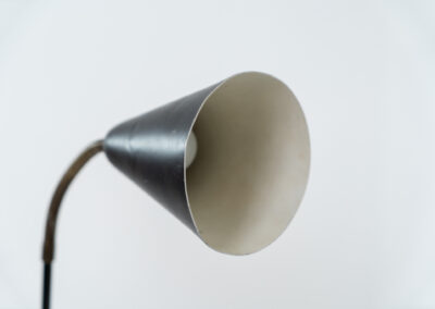 A grasshopper floorlamp by Svend Aage Holm Sørensen for ASEA (Sweden, 1950s). A contemporary and subtle piece with some beautiful details like the brass little feet or the brass joint which can be used to adjust the shade. It is newly rewired for safety reasons, furthermore it is in original condition. There are clearly traces of use and age, like some dents and scratches. We love it in this vintage condition but it can be refinished on request.