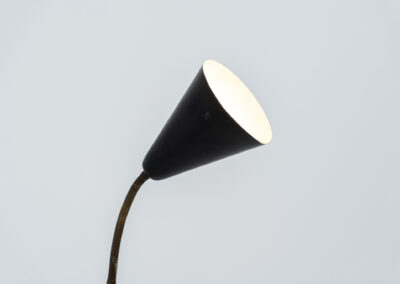 A grasshopper floorlamp by Svend Aage Holm Sørensen for ASEA (Sweden, 1950s). A contemporary and subtle piece with some beautiful details like the brass little feet or the brass joint which can be used to adjust the shade. It is newly rewired for safety reasons, furthermore it is in original condition. There are clearly traces of use and age, like some dents and scratches. We love it in this vintage condition but it can be refinished on request.