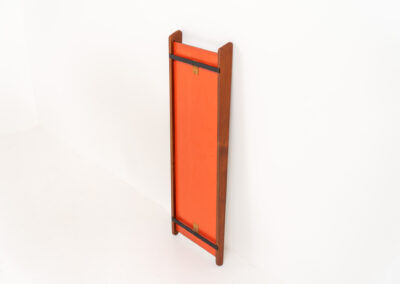 Beautiful Mid-Century wall mirror (Denmark, 1960s). It consists of a nicely rounded asymmetrical frame in solid teak. Both the glass and the wood are in very good condition.