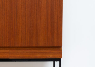 Iconic B60 sideboard in teak by Dieter Wäckerlin for Behr (Germany, 1950s). This highly sought after and significant “B60” sideboard is a masterful blend of minimalistic design and functional elegance. It’s unbelievable this piece was made in the 50’s and is yet so timeless. It contains four drawers and four doors with a minimal gap between them. The inside offers lots of storage space with adjustable shelves. It is in amazing condition with just one minor repair mark, visible on the pictures.