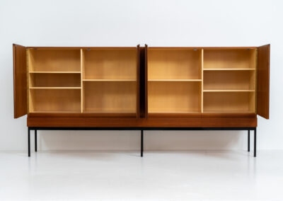 Iconic B60 sideboard in teak by Dieter Wäckerlin for Behr (Germany, 1950s). This highly sought after and significant “B60” sideboard is a masterful blend of minimalistic design and functional elegance. It’s unbelievable this piece was made in the 50’s and is yet so timeless. It contains four drawers and four doors with a minimal gap between them. The inside offers lots of storage space with adjustable shelves. It is in amazing condition with just one minor repair mark, visible on the pictures.