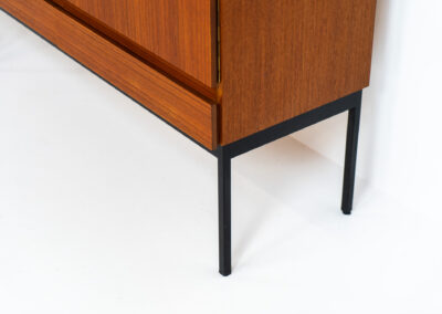 Iconic B60 sideboard in teak by Dieter Wäckerlin for Behr (Germany, 1950s). This highly sought after and significant “B60” sideboard is a masterful blend of minimalistic design and functional elegance. It’s unbelievable this piece was made in the 50’s and is yet so timeless. It contains four drawers and four doors with a minimal gap between them. The inside offers lots of storage space with adjustable shelves. It is in amazing condition with just one minor repair mark, visible on the pictures.
