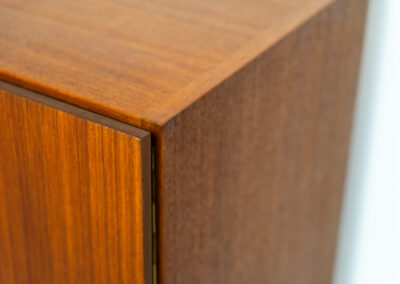 Iconic B60 sideboard in teak by Dieter Wäckerlin for Behr (Germany, 1950s). This highly sought after and significant “B60” sideboard is a masterful blend of minimalistic design and functional elegance. It’s unbelievable this piece was made in the 50’s and is yet so timeless. It contains four drawers and four doors with a minimal gap between them. The inside offers lots of storage space with adjustable shelves. It is in amazing condition with just one minor repair mark, visible on the pictures.