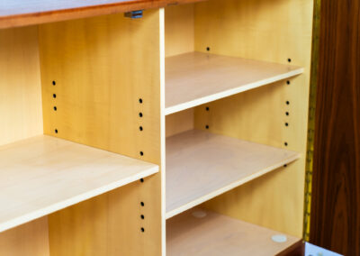 Iconic B60 sideboard in teak by Dieter Wäckerlin for Behr (Germany, 1950s). This highly sought after and significant “B60” sideboard is a masterful blend of minimalistic design and functional elegance. It’s unbelievable this piece was made in the 50’s and is yet so timeless. It contains four drawers and four doors with a minimal gap between them. The inside offers lots of storage space with adjustable shelves. It is in amazing condition with just one minor repair mark, visible on the pictures.