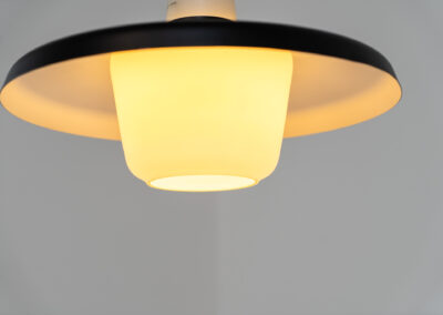 Danish opaline pendant light, 1960s. A beautiful lamp made of an opaline body and a black lacquered aluminium shade. In good condition. Newly rewired.