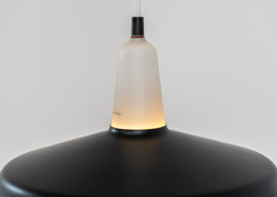 Danish opaline pendant light, 1960s. A beautiful lamp made of an opaline body and a black lacquered aluminium shade. In good condition. Newly rewired.