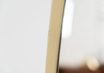 Crème “Unghia” mirror by Rodolfo Bonetto (Italy, 1970s). This elegant Unghia mirror, also known as the lipstick mirror is made out of a fiberglass body lacquered in a creamy beige color. The item remains in good condition with age-related sings on the body, such as some scratches and scuffs in the lacquer.