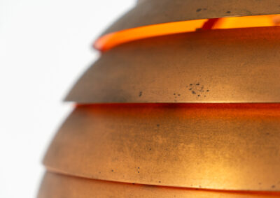 Early copper “Beehive” pendant light by Hans-Agne Jakobsson for AB Markaryd (Sweden, 1950s). Presenting this striking centerpiece. It is crafted from solid copper, and it’s age has blessed it with a stunning patina that really enhances its charm and character. It is in good and original condition and the original diffuser is still intact, the diffuser can easily be removed if you prefer the lamp without it like we do.