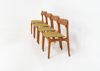 Set of 4 “Model 49” dining chairs by Erik Buch for O.D. Møbler (Denmark, 1954). A stunning, high-quality design featuring solid teak frames, a generously curved teak backrest, and signature floating seats, newly upholstered in a wonderful mustard/khaki fabric. The chairs remain in splendid condition! Marked by maker.