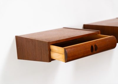 Pair of Danish floating nightstands, 1960s. These elegant nightstands are made out of teak and both feature a small drawer with nice organic inset handles on them. Both in good condition.