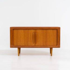 Svend Dyrlund teak sideboard with tambour doors (Denmark, 1960s). A wonderful sideboard with sought after dimensions. It perfectly combines very organic shapes and loads of detail, like the tambour sliding doors and the beautiful handles. It offers lots of storage space with two adjustable shelves on the inside. In splendid condition
