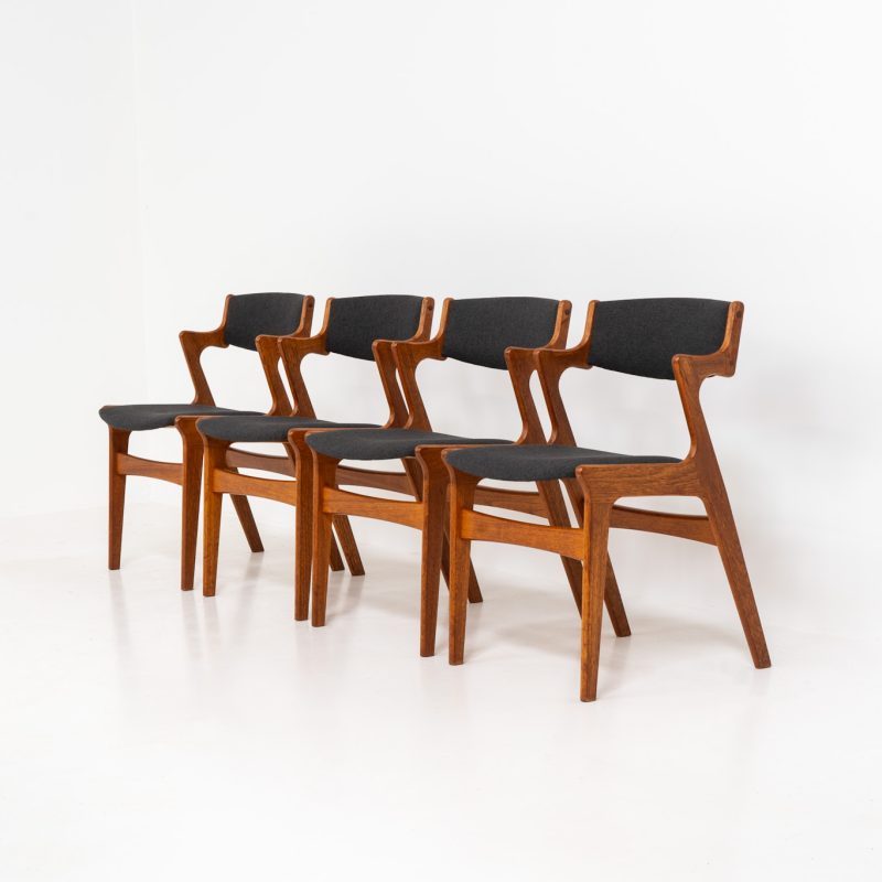 Set of 4 dining chairs by Nova Møbler (Denmark, 1960s). A very unique chair, made of solid teak frames and seats newly upholstered in a dark grey fabric. They are in very good condition and labeled by maker.