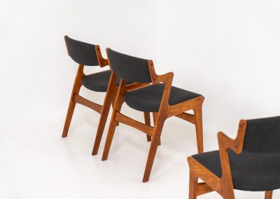 Set of 4 dining chairs by Nova Møbler (Denmark, 1960s). A very unique chair, made of solid teak frames and seats newly upholstered in a dark grey fabric. They are in very good condition and labeled by maker.