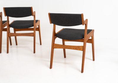 Set of 4 dining chairs by Nova Møbler (Denmark, 1960s). A very unique chair, made of solid teak frames and seats newly upholstered in a dark grey fabric. They are in very good condition and labeled by maker.