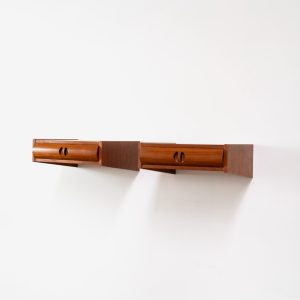 Pair of Danish floating nightstands, 1960s. These elegant nightstands are made out of teak and both feature a small drawer with nice organic inset handles on them. Both in good condition.