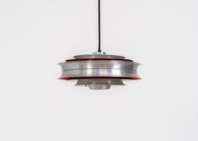 “Trava” pentant light by Carl Thore for Granhaga (Sweden - 1960s). It is made out of aluminum shades with a nice patina.The shades are laquered in a deep red on the inside which gives it a beautiful multicolored and diffused light dispersion. It clearly has some visible traces of age and use, but is overall in very nice vintage condition.