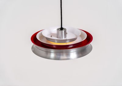 “Trava” pentant light by Carl Thore for Granhaga (Sweden - 1960s). It is made out of aluminum shades with a nice patina.The shades are laquered in a deep red on the inside which gives it a beautiful multicolored and diffused light dispersion. It clearly has some visible traces of age and use, but is overall in very nice vintage condition.