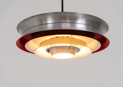 “Trava” pentant light by Carl Thore for Granhaga (Sweden - 1960s). It is made out of aluminum shades with a nice patina.The shades are laquered in a deep red on the inside which gives it a beautiful multicolored and diffused light dispersion. It clearly has some visible traces of age and use, but is overall in very nice vintage condition.