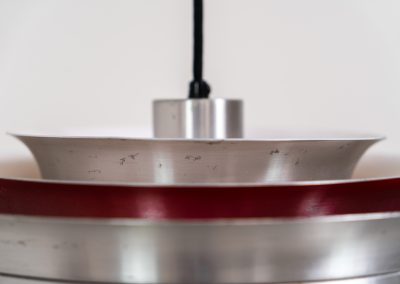 “Trava” pentant light by Carl Thore for Granhaga (Sweden - 1960s). It is made out of aluminum shades with a nice patina.The shades are laquered in a deep red on the inside which gives it a beautiful multicolored and diffused light dispersion. It clearly has some visible traces of age and use, but is overall in very nice vintage condition.