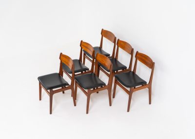 Set of 6 beautiful dining chairs attributed to Erik Buch (Denmark, 1960s). They feature organically curved solid teak frames and floating seats, newly upholstered in a black skai leather. These beauties are in excellent condition.