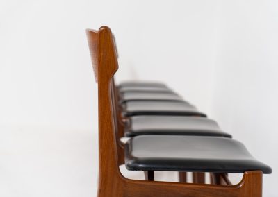 Set of 6 beautiful dining chairs attributed to Erik Buch (Denmark, 1960s). They feature organically curved solid teak frames and floating seats, newly upholstered in a black skai leather. These beauties are in excellent condition.