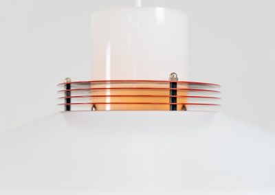 Remarkable pendant light by Lyfa (Denmark, 1970s). A beatiful piece made with a opal glass cone that goes from top to bottom and a white lacquered aluminium shade, finished with some red details. This lamp presents itself in amazingly good condition. It is newly rewired aswell.