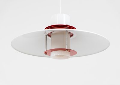 Remarkable pendant light by Lyfa (Denmark, 1970s). A beatiful piece made with a opal glass cone that goes from top to bottom and a white lacquered aluminium shade, finished with some red details. This lamp presents itself in amazingly good condition. It is newly rewired aswell.