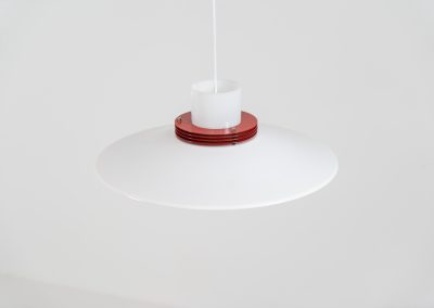 Remarkable pendant light by Lyfa (Denmark, 1970s). A beatiful piece made with a opal glass cone that goes from top to bottom and a white lacquered aluminium shade, finished with some red details. This lamp presents itself in amazingly good condition. It is newly rewired aswell.