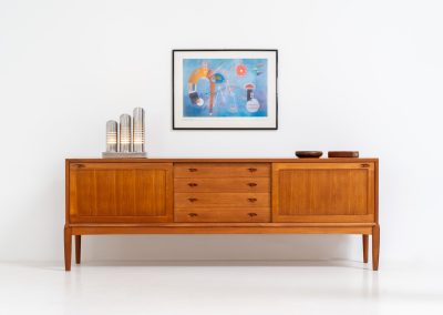 Exceptional sideboard by Henry W. Klein for Bramin (Denmark, 1960s). This is truly a masterpiece! Crafted with high-quality materials and stunning attention to detail, it offers the perfect blend of aesthetics and functionality. This piece features two big sliding doors with adjustable shelves inside, allong with four drawers. The sideboard is in excellent condition!