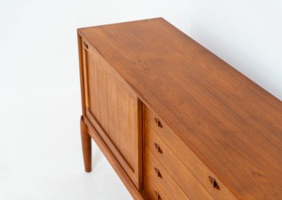 Exceptional sideboard by Henry W. Klein for Bramin (Denmark, 1960s). This is truly a masterpiece! Crafted with high-quality materials and stunning attention to detail, it offers the perfect blend of aesthetics and functionality. This piece features two big sliding doors with adjustable shelves inside, allong with four drawers. The sideboard is in excellent condition!