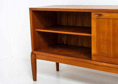 Exceptional sideboard by Henry W. Klein for Bramin (Denmark, 1960s). This is truly a masterpiece! Crafted with high-quality materials and stunning attention to detail, it offers the perfect blend of aesthetics and functionality. This piece features two big sliding doors with adjustable shelves inside, allong with four drawers. The sideboard is in excellent condition!
