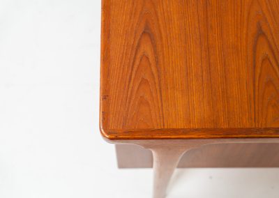 Rare executive writing desk by Ib Kofod Larsen for Faarup (Denmark, 1960s). This huge and absolutely gorgeous piece is one of the highest-quality desks we’ve come across, with an incredible attention to detail! Featuring a spacious desktop with a beautiful woodgrain, two cabinets with locks and an open shelve on the backside, two pull/out leafs and six big drawers on the frontside. Two of the drawers can be securely locked with cleverly hidden locks on the inside. The desk is double sided which makes it a stunning piece to place in the center of a room. This piece presents itself in very good condition. All drawers, doors & locks function very smoothly! It can be easily disassembled for transport or storage.