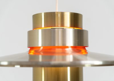 Stunning pendant light by Carl Thore for Granhaga (Sweden - 1960s). It is made out of brushed aluminum shades and has some orange details on the inside which create a very cool effect when the lamp is turned on. It’s in very good condition!