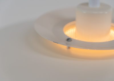 Elegant pendant light by Jeka Metaltryk (Denmark, 1970s). A minimalistic and timeless design made out of four aluminium shades, lacquered in an off-white color. It is in very good condition with one little scuff in the paint, as shown on the pictures.