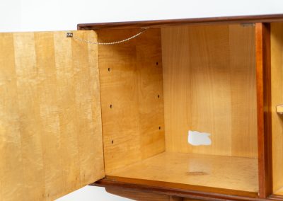 Paola sideboard by Oswald Vermaercke for V-Form (Belgium, 1959). An amazing design with a lot of details and a highly sought after dimensions. Featuring one folding door, two sliding doors and four drawers with beautifully curved bentwood interiors. It’s made out of teak and stands on an oak frame. While it has been restored, it still shows signs of its history, with visible use marks and some veneer patches from repairs. Given its age, it remains in good vintage condition.