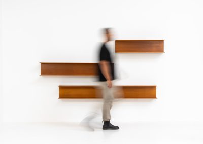 Set of 3 huge wall shelves by Walter Wirz for Wilhelm Renz (Germany, 1965). These iconic U-shaped wall shelves in teak are just stunning. They are sleek, timeless and absolutely beautiful. The shelves remain in very good and original condition. They are labeled.