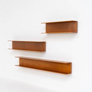 Set of 3 huge wall shelves by Walter Wirz for Wilhelm Renz (Germany, 1965). These iconic U-shaped wall shelves in teak are just stunning. They are sleek, timeless and absolutely beautiful. The shelves remain in very good and original condition. They are labeled.