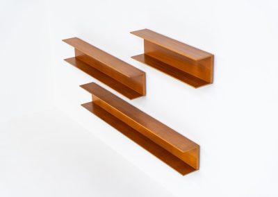 Set of 3 huge wall shelves by Walter Wirz for Wilhelm Renz (Germany, 1965). These iconic U-shaped wall shelves in teak are just stunning. They are sleek, timeless and absolutely beautiful. The shelves remain in very good and original condition. They are labeled.