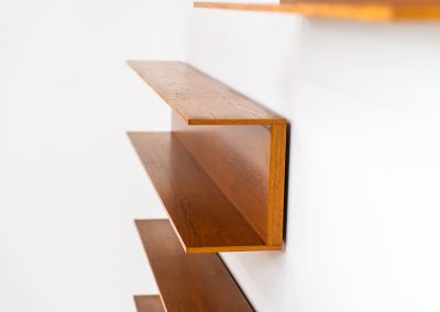 Set of 3 huge wall shelves by Walter Wirz for Wilhelm Renz (Germany, 1965). These iconic U-shaped wall shelves in teak are just stunning. They are sleek, timeless and absolutely beautiful. The shelves remain in very good and original condition. They are labeled.