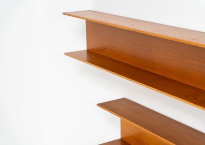 Set of 3 huge wall shelves by Walter Wirz for Wilhelm Renz (Germany, 1965). These iconic U-shaped wall shelves in teak are just stunning. They are sleek, timeless and absolutely beautiful. The shelves remain in very good and original condition. They are labeled.