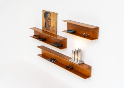 Set of 3 huge wall shelves by Walter Wirz for Wilhelm Renz (Germany, 1965). These iconic U-shaped wall shelves in teak are just stunning. They are sleek, timeless and absolutely beautiful. The shelves remain in very good and original condition. They are labeled.