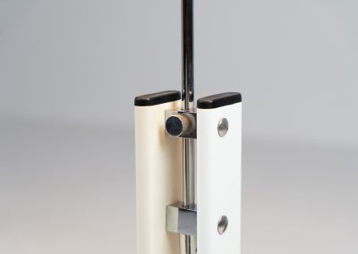 Danish table lamp, 1970s. We don’t know who made this one, but it is clearly inspired by Louis Poulsen’s work. The lamp is easy adjustable in highly with a chrome wheel. It’s made out of white lacquered metal with chrome details. It is in good vintage condition. The shade is not perfectly aligned anymore and the lacquer has some small color differences.